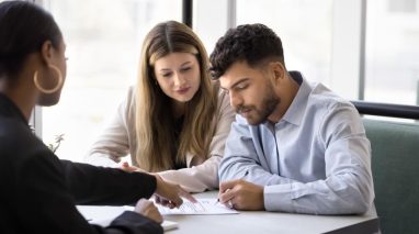 Agent walking a policyholder through the claim filing process